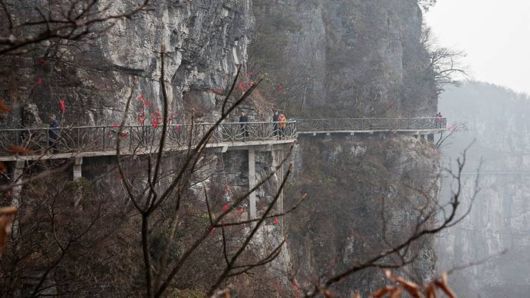 A Scary Skywalk On Glass Bridge, China