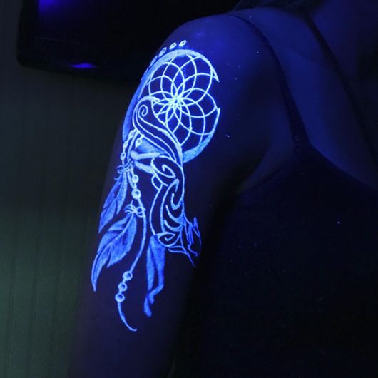 Glowing In The Dark Tattoos Visible Under Black Light